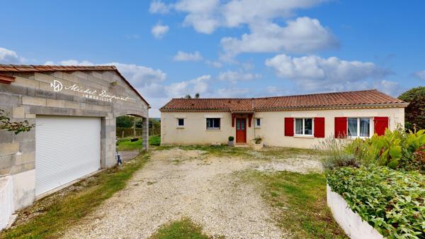 Maison contemporaine de plain pied de 120 m² sur 2582 m² de parc clôturé