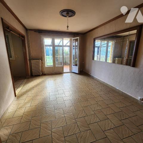 Maison familiale avec garage, jardin clos et véranda