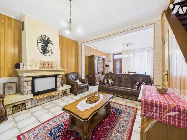 Maison individuelle avec jardin, garage et beaux volumes.