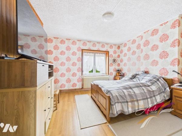 Maison individuelle avec jardin, garage et beaux volumes.