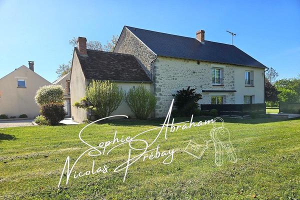 Maison en pierres de 9 pièces avec dépendances, garage et terrain