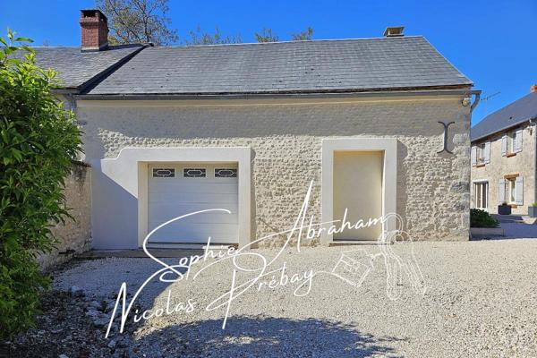 Maison en pierres de 9 pièces avec dépendances, garage et terrain