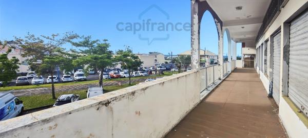 Immeuble 330 m² – Hyper Centre Saint-Benoît – Multiples Possibilités d’Exploitation