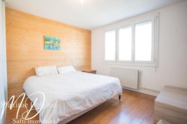 Maison au calme avec 4 chambres, garage et jardin