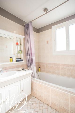 Maison au calme avec 4 chambres, garage et jardin