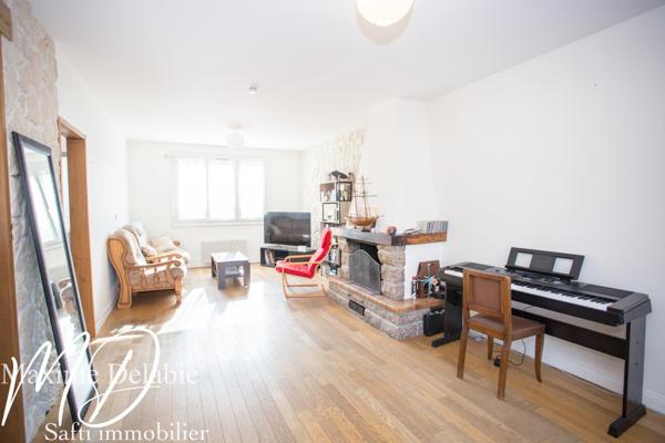Maison au calme avec 4 chambres, garage et jardin