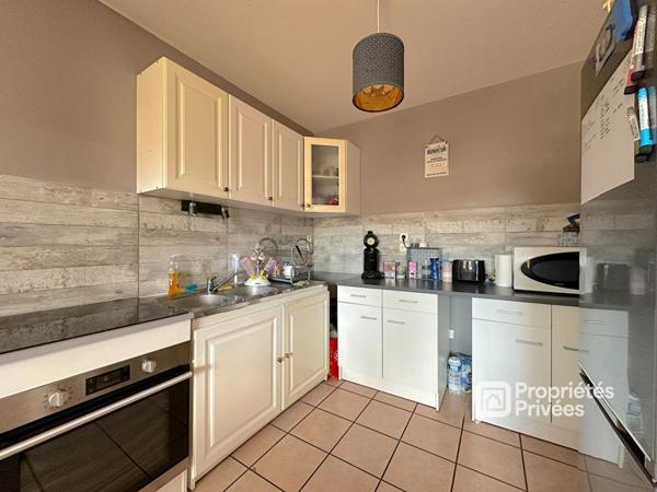 Appartement 2 pièces 46,5m2 avec balcon, garage et parking