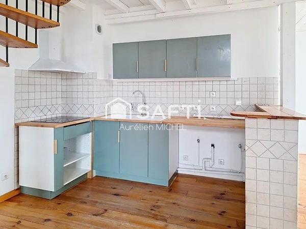Joli appartement avec plein de charme avec sa charpente apparente
