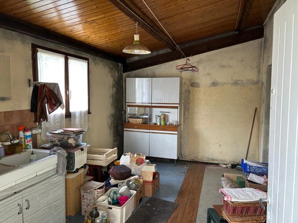 MAISON DE 1967, 4 CHAMBRES, GARAGE ET VERANDA SUR 400M² EN SECTEUR RÉSIDENTIEL