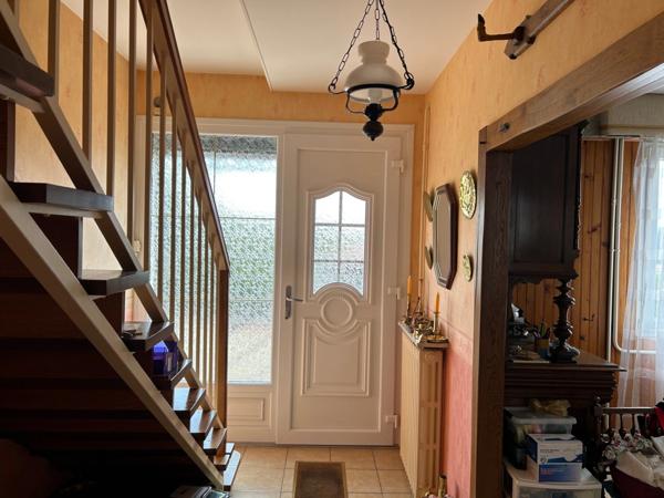 MAISON DE 1967, 4 CHAMBRES, GARAGE ET VERANDA SUR 400M² EN SECTEUR RÉSIDENTIEL