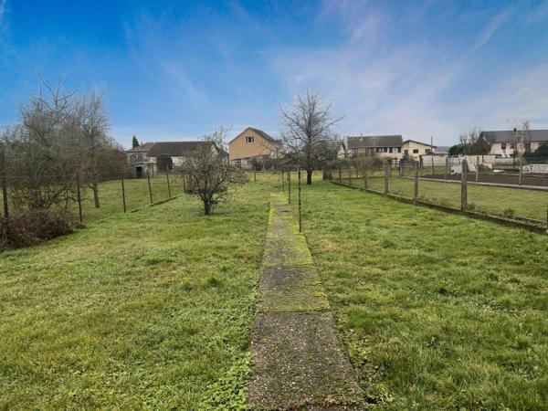 Maison individuelle avec 4 chambres sur terrain de 7,5 ares