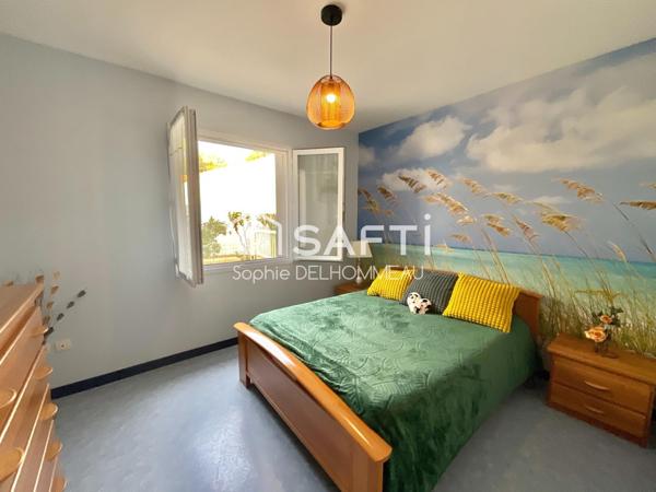 Maison plain-pied 3 chambres terrain clos paysagé