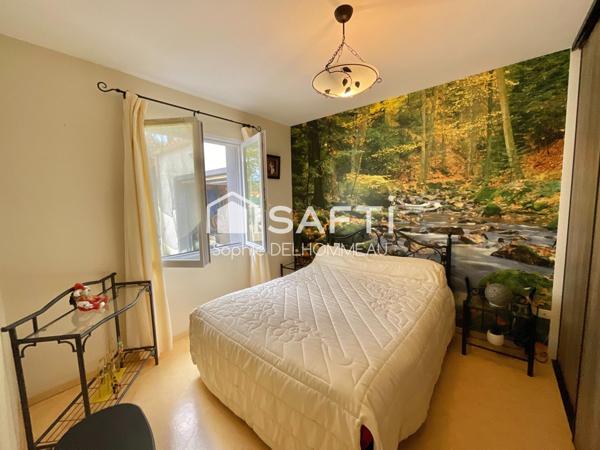 Maison plain-pied 3 chambres terrain clos paysagé