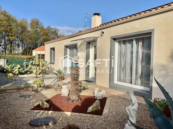 Maison plain-pied 3 chambres terrain clos paysagé