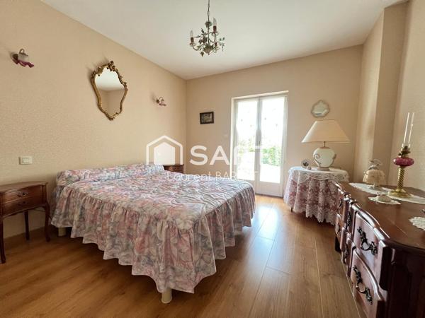 Villa avec chambre en rez-de-jardin et grand garage