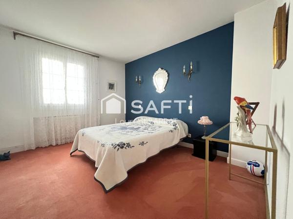Villa avec chambre en rez-de-jardin et grand garage
