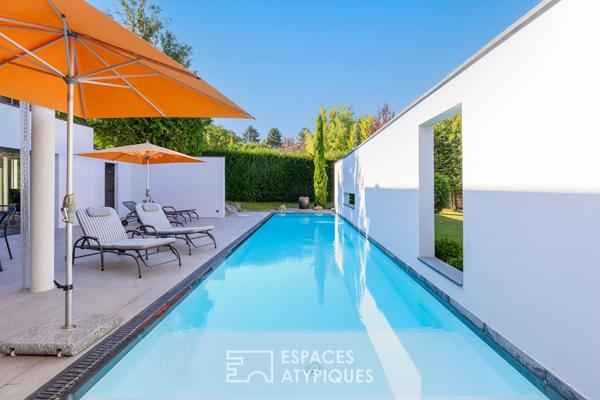 Maison contemporaine et sa piscine au coeur du Rebberg