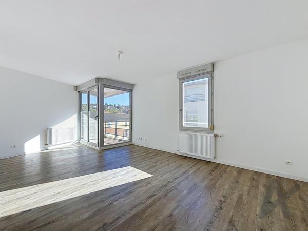 Appartement T4 avec balcon et stationnement