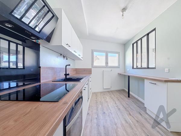 Appartement T4 avec balcon et stationnement