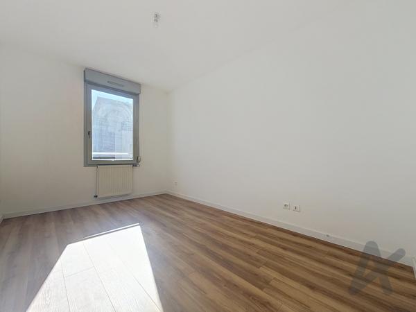 Appartement T4 avec balcon et stationnement