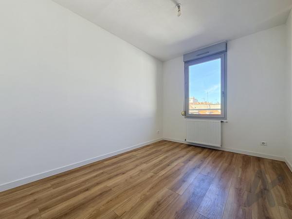 Appartement T4 avec balcon et stationnement