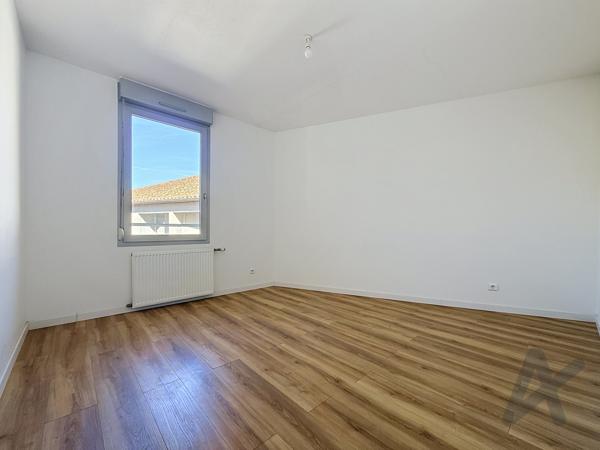Appartement T4 avec balcon et stationnement