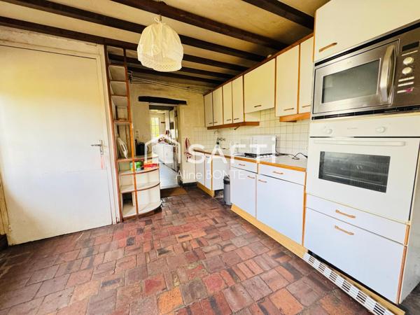 Propriété de deux habitations avec un garage