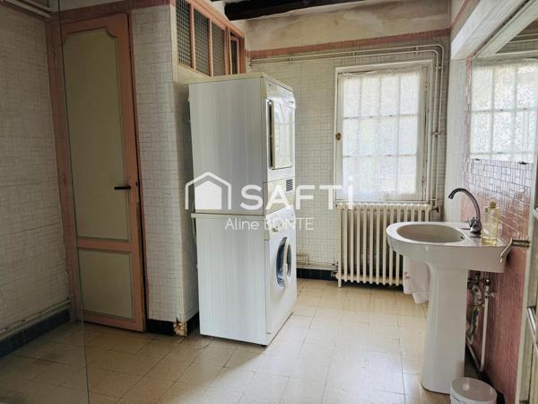 Propriété de deux habitations avec un garage