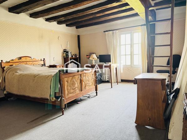 Propriété de deux habitations avec un garage