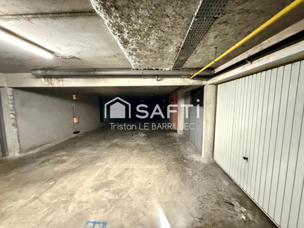 Place de parking / garage de 14 m2  en plein centre-ville.