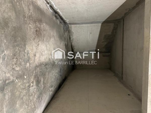 Place de parking / garage de 14 m2  en plein centre-ville.