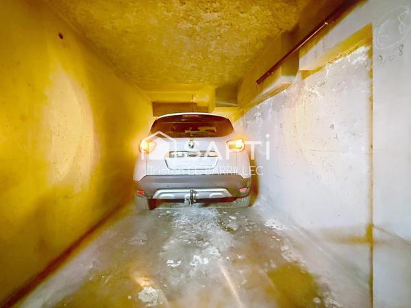 Place de parking / garage de 14 m2  en plein centre-ville.