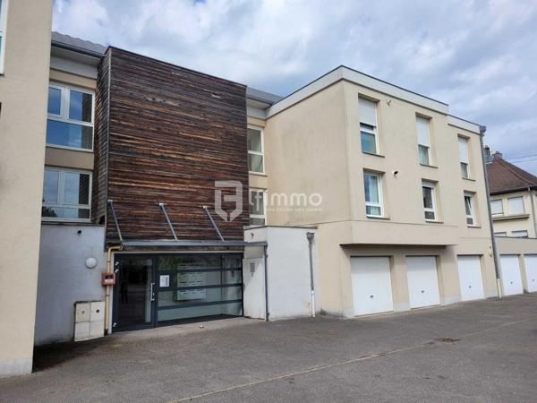 Appartement 3 pièces en rez-de-chaussée , garage et parking