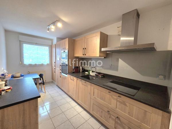 Appartement 3 pièces en rez-de-chaussée , garage et parking