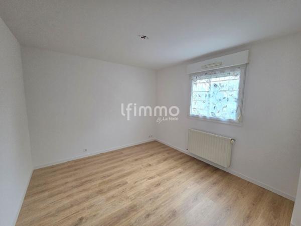 Appartement 3 pièces en rez-de-chaussée , garage et parking