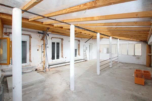 Appartement de 140 m² avec cour privative et dépendance en plein centre-ville