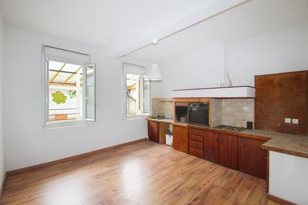 Appartement de 140 m² avec cour privative et dépendance en plein centre-ville