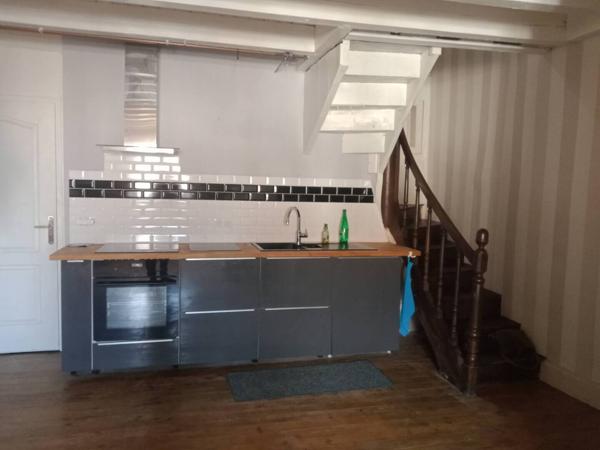 Joli magasin avec habitation au dessus