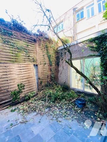 Centre-ville de DUNKERQUE : Duplex du 19ième, alliant authenticité et cachet d'époque.