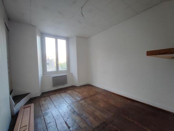 Immeuble à rénover avec beau potentiel