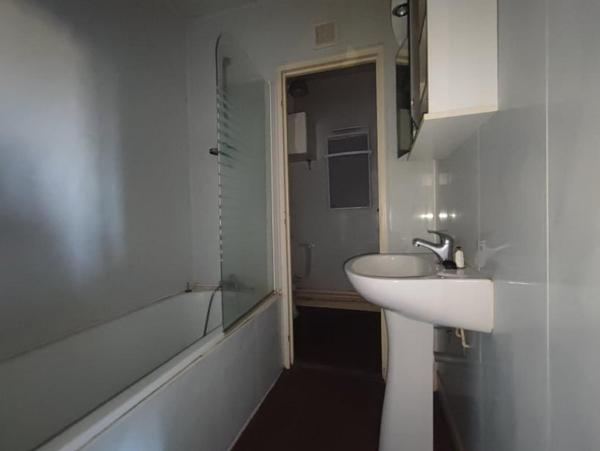 Immeuble à rénover avec beau potentiel