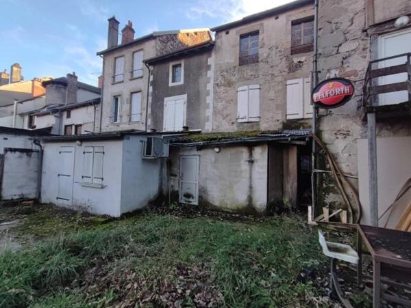 Immeuble à rénover avec beau potentiel