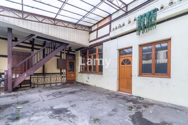 Maison 6 pièces au centre-ville avec cour intérieure