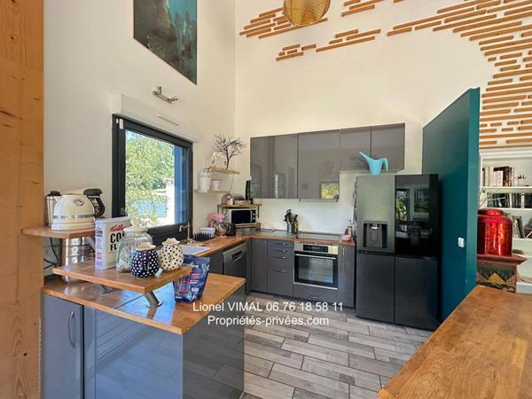 Ensemble immobilier Maison 220 m2 avec local commercial ( env 90 m2 )