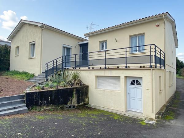 ANGOULEME PROXIMITE GARE TGV, bus, lycée et supermarchés : maison en trés bon état avec garage et jardin.