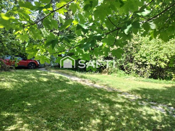 Maison de 79m²(56m² loi carrez) avec terrasse et jardin de 815m² cloturé et arborés