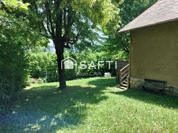 Maison de 79m²(56m² loi carrez) avec terrasse et jardin de 815m² cloturé et arborés