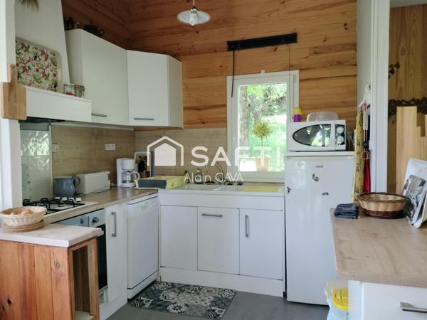 Maison de 79m²(56m² loi carrez) avec terrasse et jardin de 815m² cloturé et arborés