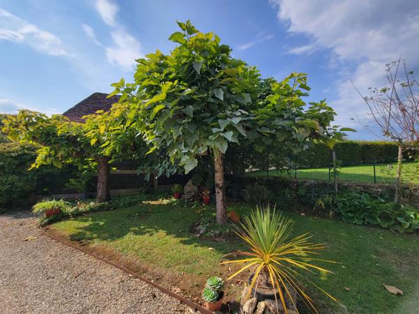 Charmante maison située dans de superbes jardins