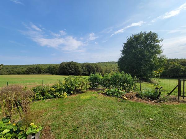 Charmante maison située dans de superbes jardins